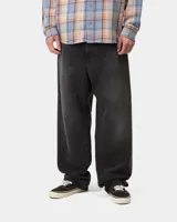 Jeans Landon Pant de Carhartt WIP en color negro gastado, corte holgado y diseño de pernera ancha.