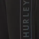 Pantalón de jogging negro de algodón y poliéster, con cintura elástica ajustable con cordón, bolsillos laterales y logo reflectante multicolor.