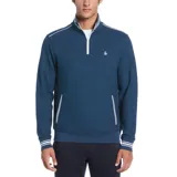 Buzo deportivo azul con cuello alto con cierre 1/4, mangas largas y bolsillos laterales con ribete blanco. Tiene puños acanalados con rayas blancas y logo bordado en el pecho.