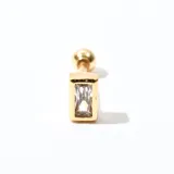 Caravana dorada con forma rectangular y una circonita engarzada.