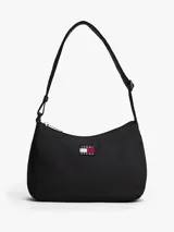 Cartera de hombro tipo baguette de Tommy Jeans, color negro, con cierre de cremallera y correa ajustable de tejido trenzado. Presenta el parche distintivo de la marca en la parte frontal.