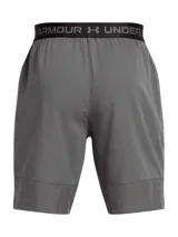 Short deportivo Under Armour Vanish Woven, color gris, con diseño ultraligero y transpirable. Cuenta con bolsillos laterales, cintura elástica con cordón ajustable y aberturas en el bajo para mayor movilidad.