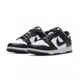 Championes Nike Dunk Low de diseño clásico, confeccionados en cuero sintético con una combinación de colores blanco y negro.