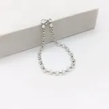 Pulsera de eslabones tipo rolo confeccionada en plata 925, con cierre de mosquetón.