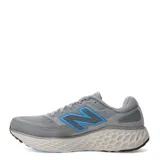 Championes de running New Balance Evoz Fresh Foam para hombre, color gris con detalles en azul y suela amortiguada.