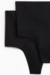 Pack de dos bombachas colaless negras de tiro alto con efecto moldeador vientre plano y refuerzo interior.