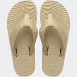 Ojotas Havaianas Surfer Coast color beige, con tiras de tela y suela texturizada.