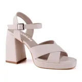 Sandalias de vestir Korium Arona color beige con plataforma y taco cuadrado alto. Tiras cruzadas en el empeine y pulsera con hebilla al tobillo.