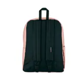 Mochila Jansport modelo Superbreak, de color rosado con etiqueta frontal de la marca. Cuenta con un amplio compartimento principal y un bolsillo delantero con cierre.