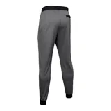 Pantalón de jogging Under Armour, color gris jaspeado, con cintura elástica ajustable con cordón, puños en los tobillos y bolsillos laterales con cierre. Presenta el logo de la marca estampado en la pierna derecha.