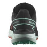 Championes de trail running Salomon Thundercross, color negro con suela verde menta y detalles en naranja. Cuentan con tacos agresivos de 5 mm, amortiguación dinámica y sistema de ajuste preciso.