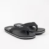 Ojotas negras marca Volcom, con logo blanco en la tira.