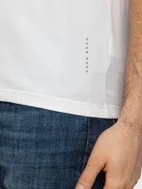 Musculosa blanca de algodón con cuello redondo y sisas amplias. Pack de dos unidades.