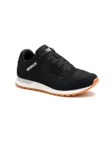 Championes Caterpillar modelo Ventura para mujer, de color negro con suela de goma caramelo y entresuela blanca. Confeccionados con capellada de gamuza y lona, cordones negros y el logo de la marca impreso en el lateral y la lengüeta.