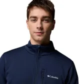 Campera polar de Columbia color azul marino, con cuello alto, cierre frontal completo y un bolsillo en el pecho con cierre.