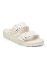 Sandalias Birkenstock Arizona Eva color blanco hueso, con dos correas ajustables con hebillas y plantilla anatómica.