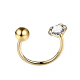 Piercing tipo herradura de acero quirúrgico, con un extremo de esfera lisa y el otro con una zirconia engastada.