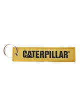 Llavero de tela color amarillo con borde bordado y el logotipo de Caterpillar en negro. Incluye una argolla metálica circular.
