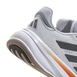 Championes Adidas Response Super grises con detalles en negro y naranja.