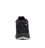 Bota de senderismo impermeable Columbia modelo Peakfreak Hera Mid Outdry, en color negro con detalles en bordó y suela blanca y negra. Confeccionada con empeine transpirable, tecnología de amortiguación Techlite+ y suela de gran tracción Adapt Trax.
