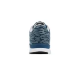 Championes Asics modelo Streetwise, color negro con detalles en gris y suela blanca. Diseño deportivo con tejido transpirable y logo lateral característico de la marca.