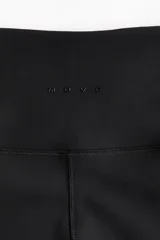 Leggings deportivos negros de corte amplio con tecnología SoftMove™ y DryMove™, de tiro alto y cintura ancha.