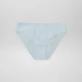 Pack de siete bombachas de corte clásico, confeccionadas en algodón liso en una variedad de colores pasteles y vibrantes, con terminaciones de picot en la cintura y aberturas de piernas.