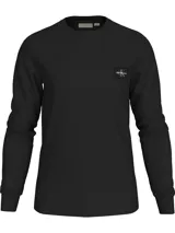 Remera de manga larga negra, confeccionada en punto de algodón gofrado, con cuello redondo y puños de punto. Presenta una pequeña insignia con el monograma de Calvin Klein en el bajo.