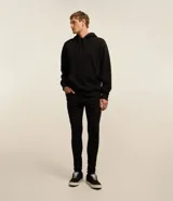 Pantalón skinny negro de sarga con elastano.