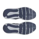 Championes Under Armour Charged Surge 4 de hombre, color azul marino con logo blanco y suela blanca.