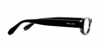 Lentes blueblocker con montura ovalada de color negro y cristales transparentes.