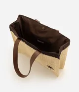 Cartera de playa Bossa Nossa de formato rectangular, confeccionada en papel trenzado con diseño bicolor en beige y marrón oscuro. Cuenta con asas de hombro de material sintético marrón, detalles de costuras decorativas y un bordado frontal de una palmera.