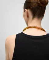 Top sin mangas de algodón con textura acanalada, cuello redondo y corte ajustado al cuerpo.