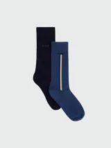 Pack de dos pares de medias largas Hugo Boss, una en color azul marino liso y otra en tono azul más claro con detalles de líneas verticales en el centro y logo de la marca bordado.