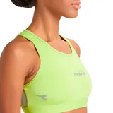 Top deportivo Diadora T2 L. Medium Bra, color lima, con logo de la marca en el frente y en el lateral.
