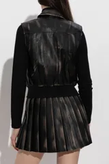 Chaleco estilo bomber Diesel G-Inko confeccionado en tejido con acabado efecto cuero y apariencia desgastada de color negro. Presenta cuello camisero, cierre frontal con cremallera, bolsillos ribeteados y terminaciones de canalé en el bajo. Cuenta con el logotipo Oval D en relieve en el pecho.