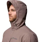 Campera impermeable Columbia modelo Hikebound II, color gris, con capucha ajustable y cierre frontal. Presenta el logo de la marca bordado en el pecho.