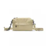 Bolso bandolera Nike Futura Luxe color beige, con correa ajustable y logo de Nike en el frente.