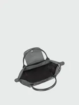 Cartera de mano Longchamp modelo Le Pliage One talla S, color amarillo, con solapa de cuero y cierre de botón a presión, asas cortas de mano y cierre superior con cremallera.