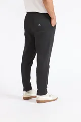 Pantalón de jogging Quiksilver color negro, con cintura elástica con cordón ajustable y bolsillos laterales.