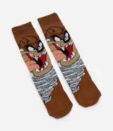Par de medias de caña larga color marrón, con estampado del personaje Taz de Looney Tunes.