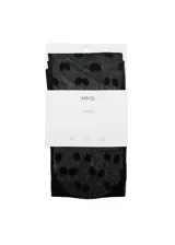 Medias de nylon negras con estampado de lunares negros, diseño transparente y elástico.