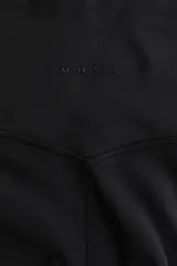 Leggings deportivos negros de tiro alto con cintura ancha y tejido funcional que ayuda a absorber el sudor.