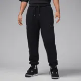 Pantalón de jogging Jordan negro de polar de pelo largo con bolsillos cargo y cintura elástica con cordón ajustable.