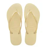 Chancletas Havaianas modelo Slim de color dorado, con suela de goma texturizada y tiras finas metálicas.