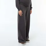 Pantalón de jogging de corte ancho y fluido, diseñado específicamente para maternidad, con cintura elástica cómoda.