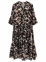 Vestido largo negro con estampado floral en tonos beige, escote en V con botones frontales y mangas tres cuartos con volados.