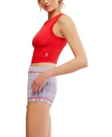 Top deportivo sin mangas de estilo musculosa, con ajuste al cuerpo y diseño recortado. Presenta una textura acanalada y un escote redondo.