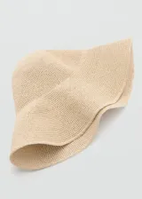 Sombrero flexible de ala ancha color beige, tejido con efecto paja.