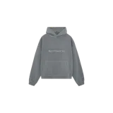 Hoodie oversize gris de Eme Studios con capucha, bolsillo frontal tipo canguro y el logo de la marca bordado en el pecho. Diseño holgado con hombros caídos y puños y dobladillo de rib elástico.